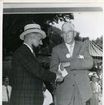 Mayor Fraser greeting a former Mayor, D.R. McCahill of Hamilton